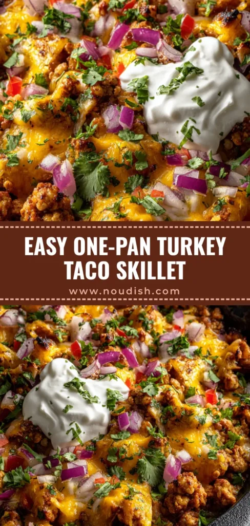 A rustic black cast iron skillet filled with savory Ground Turkey Taco Skillet, topped with melted sharp cheddar, diced red onion, and sour cream.