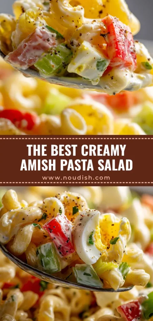 A towering, creamy scoop of Amish Pasta Salad showing glossy macaroni, diced red peppers, and crumbled eggs.