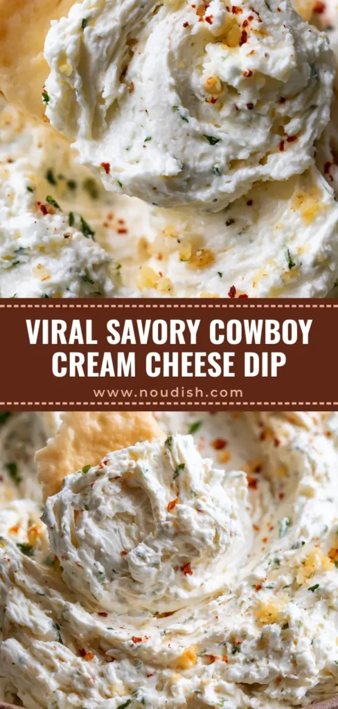 A close-up of a rustic bowl of Cowboy Cream Cheese with a buttery cracker lifting a thick swirl of whipped cheese, showing green herbs and red cayenne specks.