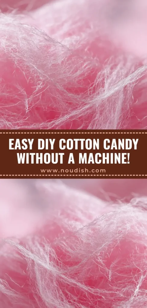 A fluffy mound of pink cotton candy on a paper cone, showcasing the intricate web-like texture and stray airy fibers. (Homemade Cotton Candy Without a Machine)
