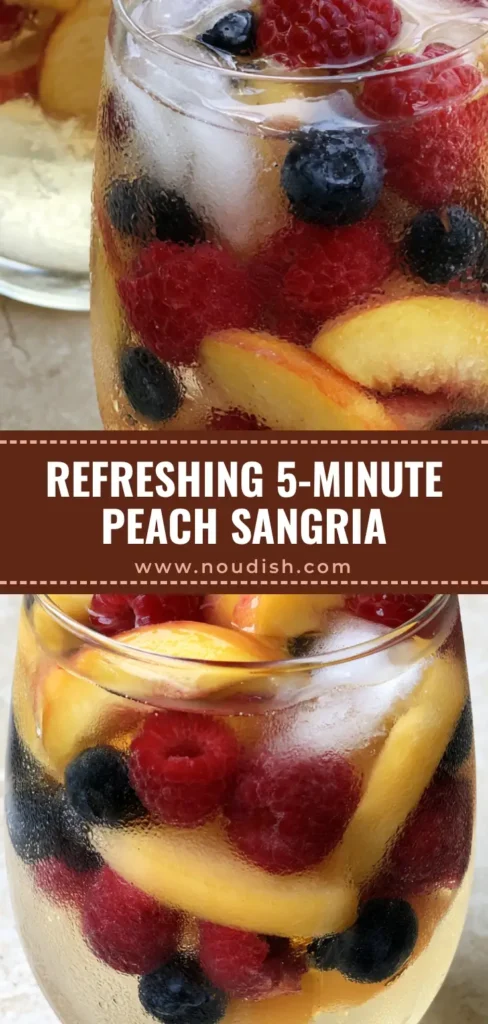 A close-up shot of a glass pitcher filled with golden Peach Moscato Sangria, featuring sliced peaches, red raspberries, and dark blueberries over ice.