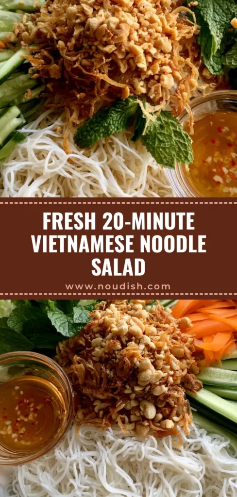 A close-up vertical shot of a Vietnamese Noodle Salad bowl with rice vermicelli, pickled carrots, mint, and peanuts, captured in bright natural light. (Vietnamese Noodle Salad)