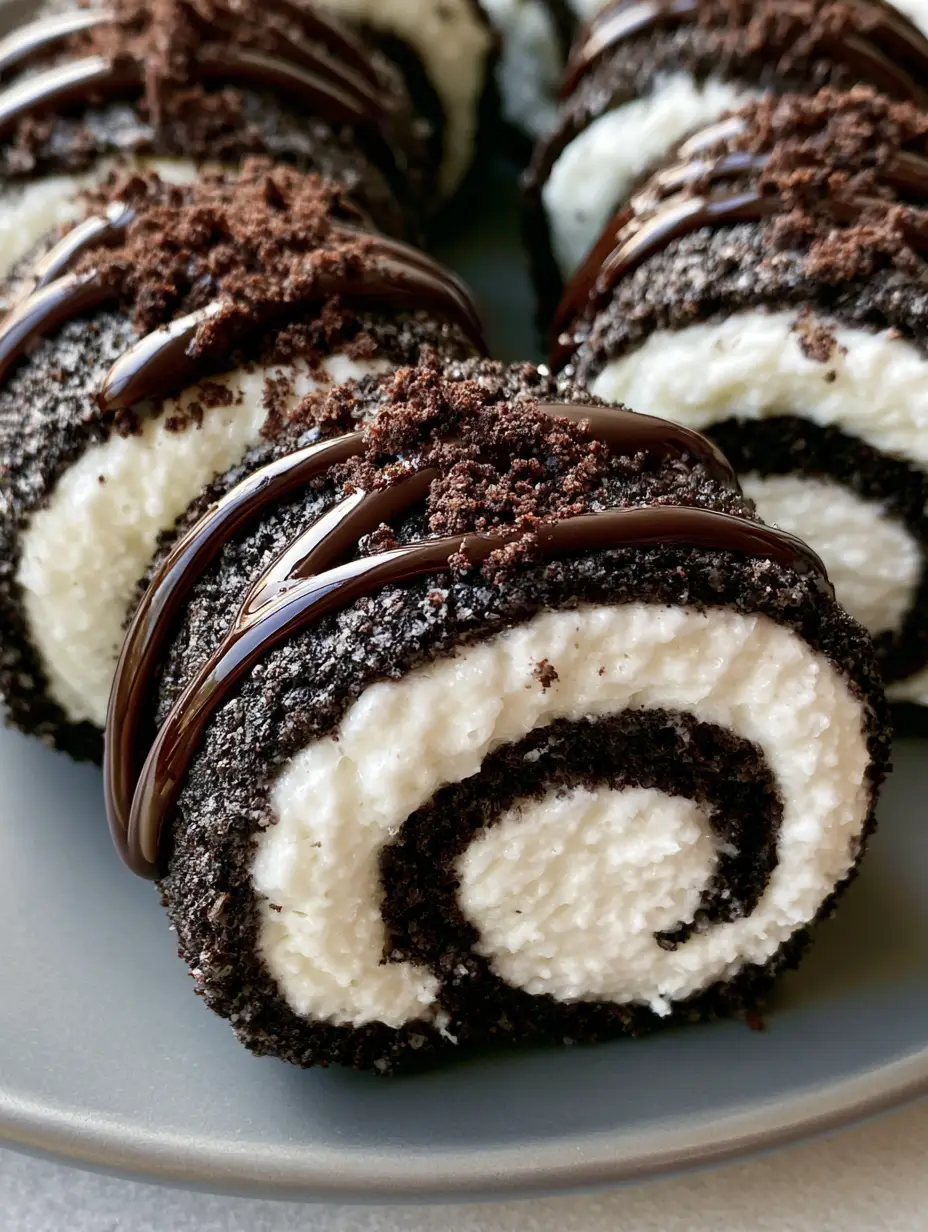 Oreo Sushi Rolls: The Ultimate No-Bake Viral Dessert 4 Top-down view of uniform Oreo Sushi Rolls showing the thick bright white cream filling spiral.