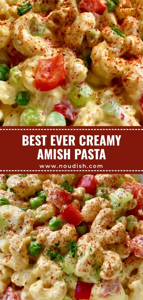 A close-up vertical shot of creamy Amish Pasta Salad in a white bowl, showing elbow macaroni, eggs, and peas with a paprika garnish.
